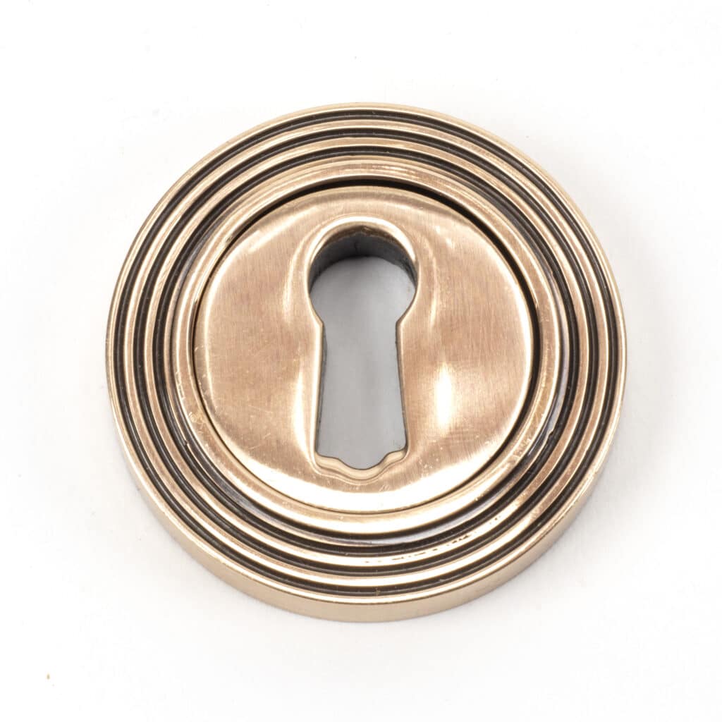 Polished Bronze Round Escutcheon (Beehive) 1