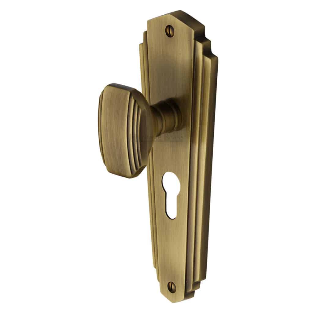 Heritage Brass Door Handle for Bathroom Delta Design Satin Brass Finish 1